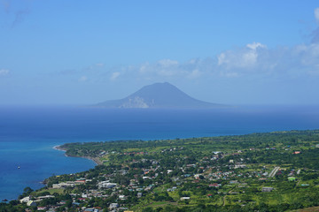 Landscape view of the volcanic Caribbean island of Sint Eustatius seen from St Kitts 