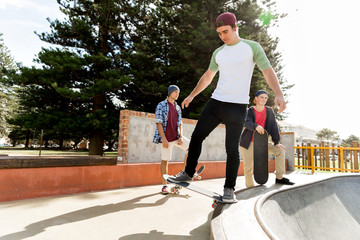 Teenage boy skateboarding outdoors