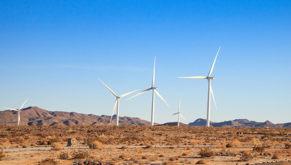 wind turbines on a wind farm that generate electricity