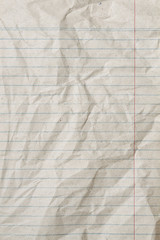 Rumpled vintage sheet of lined paper or notebook paper with right margin