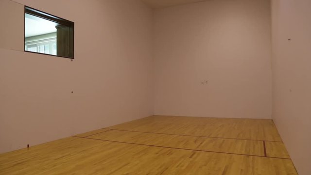 Racket ball against the court walls.