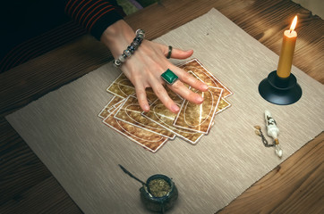 Tarot cards on fortune teller desk table. Future reading.