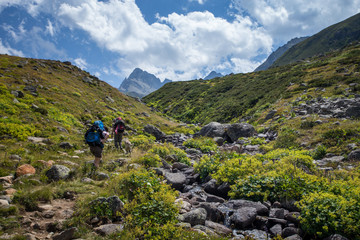 Fototapeta na wymiar hikers with large backpacks hiking on mountain Kackarlar