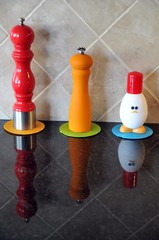 salt, pepper and egg boiler. Colorful arrangement on a Kitchen counter