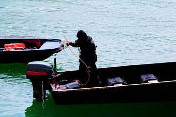 Silhouette  soldier on  Boat in river with copy space add text