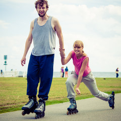 roller skater couple skating outdoor