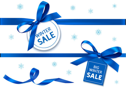 Decorative horizontal blue ribbon with bow and sale tag for winter holiday sale design. Vector decoration and label