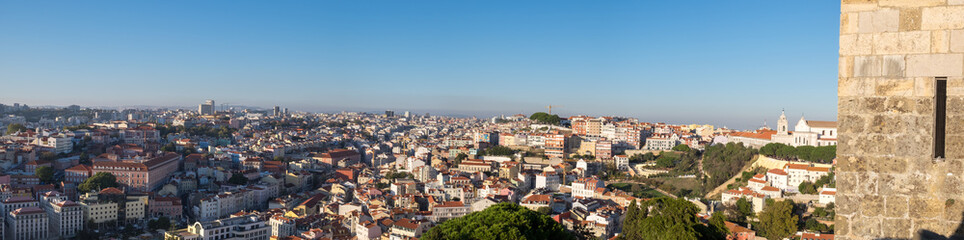 Fototapeta na wymiar Beautiful large panoramic aerial view of Lisbon red roofs from Saint Jorge Castle. Portugal