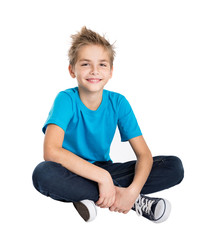Young man sitting on the floor - 182510496