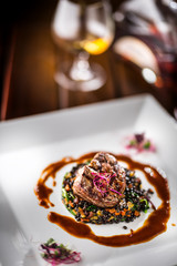 Beef Steak. Grill beef steak black lentils mixed with vegetable. Cognac or brandy as drink. Culinary food in hotel pub or restaurant
