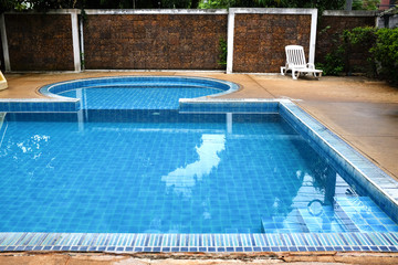 Swimming pool on the backyard 