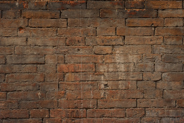 Old brick wall, old texture of red stone blocks close-up