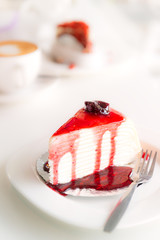 Delicious sweet piece of cake in bakery shop