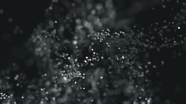 Abstract 3d rendering of chaotic particles. Computer generated flying polygonal cubes in empty space. Futuristic motion background design with bokeh effect. 4k UHD