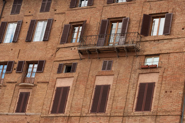 Fototapeta na wymiar Details of Piazza del Campo.The historic centre of Siena has been declared by UNESCO a World Heritage Site. Beautiful historic buildings and palaces. Siena, Italy