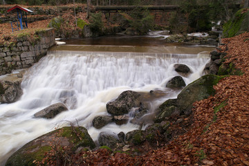 Weir below a small hydroelectric powerplant on Cerna Desna river, Jizera Mountains, Czech Republic