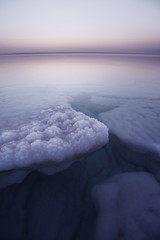 Salt on the Dead Sea. Sunset, Jordan landscape