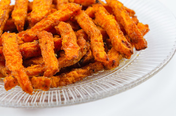 Homemade organic pumpkin. Traditional autumn dishes from pumpkin. Fried baked on grill pumpkin with spices and olive oil..