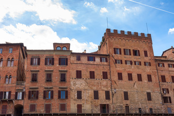 Fototapeta na wymiar Piazza del Campo, Siena, Italy.The historic centre of Siena has been declared by UNESCO a World Heritage Site. Beautiful historic buildings and palaces.