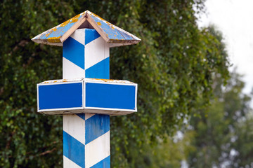 vintage signpost. Blue, white
