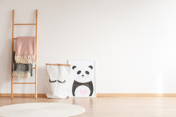 Kid's room with panda drawing