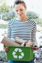 Satisfied housewife using recycling ecosystem