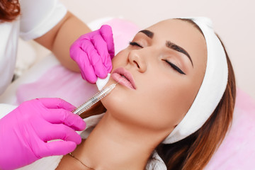 Procedure filler injection in beauty clinic.