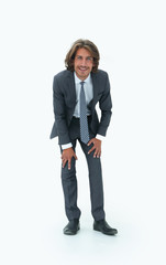 Young handsome businessman bending down.