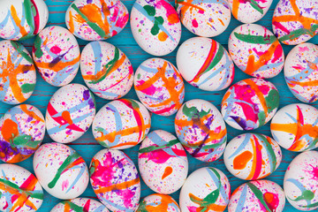 White eggs painted as festive Easter background