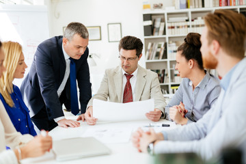 Business people having a board meeting