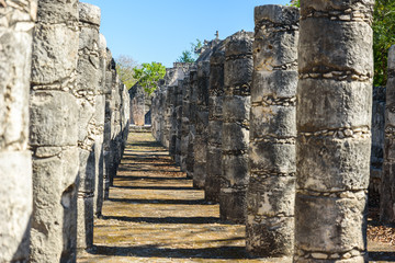 Fototapeta na wymiar Ruins of Chichen Itza, Columns in the Temple of a Thousand Warriors, Yucatan, Mexico