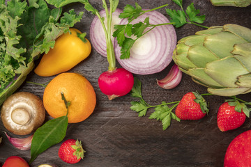Overhead photo of fresh vegetables and fruits with copy space