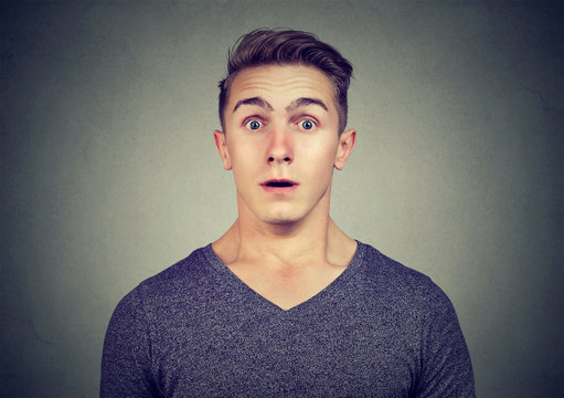 Portrait Of A Young Man With Shocked Facial Expression