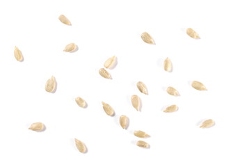 Peeled sunflower seeds isolated on white background, top view