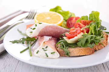 bruschetta with rocket and tomato and ham with cheese