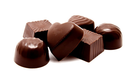 Assortment of chocolate candies sweets isolated on a white