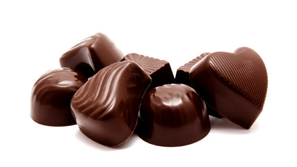 Assortment of chocolate candies sweets isolated on a white