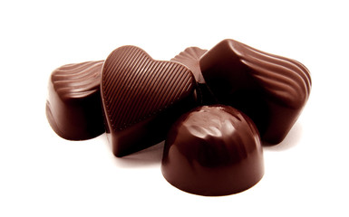 Assortment of chocolate candies sweets isolated on a white