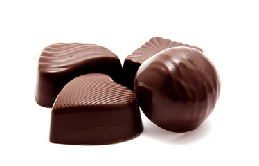 Assortment of chocolate candies sweets isolated on a white