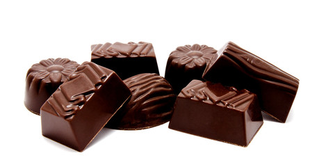 Assortment of chocolate candies sweets isolated on a white