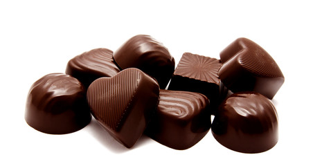 Assortment of chocolate candies sweets isolated on a white