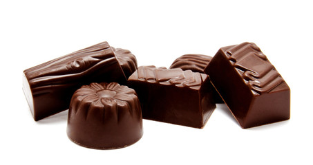 Assortment of chocolate candies sweets isolated on a white