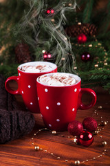 Cup of hot chocolate with marshmallows on a wooden table