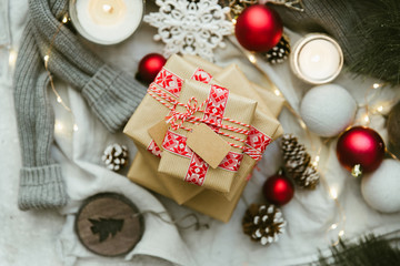 Christmas gift. Still life of homemade wrapped Christmas present. Top view, vintage toned image