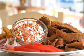 Doner kebab with dzadziki sauce, Greek gyros
