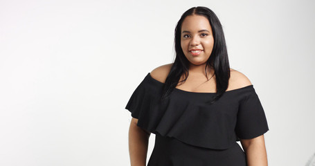 Plus size model in studio shoot happy smiling