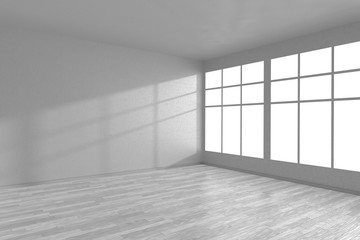 Corner of white empty room with large windows.