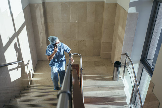 Man walking up stairs in hospital