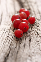 Cranberries close-up on old wood