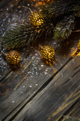 christmas decoration and tree on the wooden background, selective focus